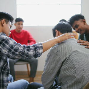 multiethnic-members-supporting-rehab-session-male-2026-01-09-10-49-55-utc